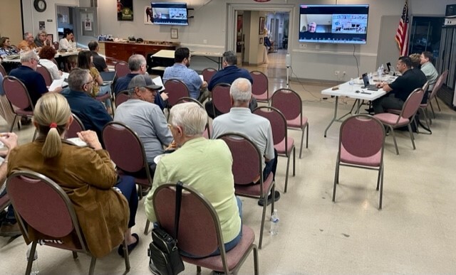 From the back of the room, a crowd of residents sitting and listening to a presentation by Desert Healthcare District and Foundation interim CEO Chris Christensen. Staff Photo