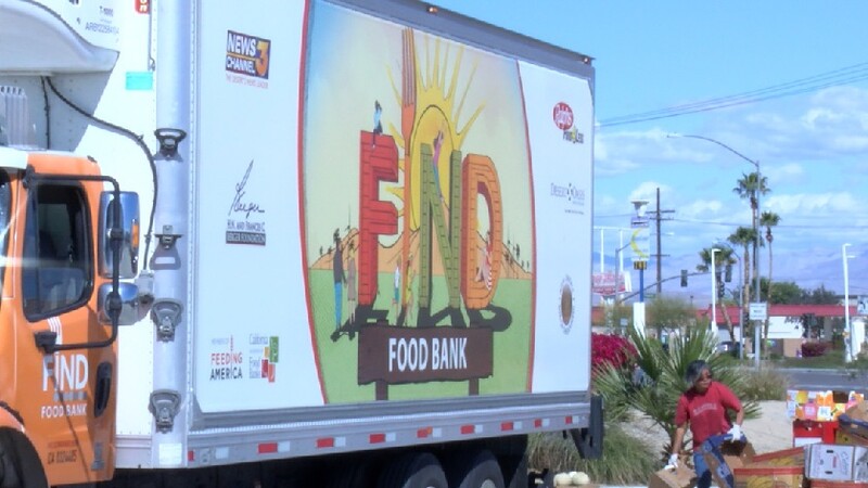 FIND establishes additional mobile food pantries in response to Covid-19. FIND Food truck with colorful sign on the side